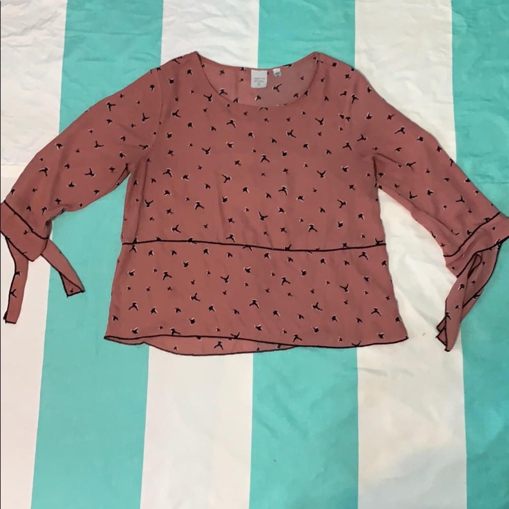 The pink bird shirt